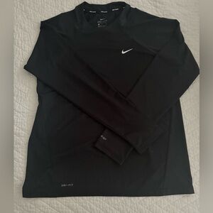 Women’s Nike swim shirt. NWOT, washed but never worn